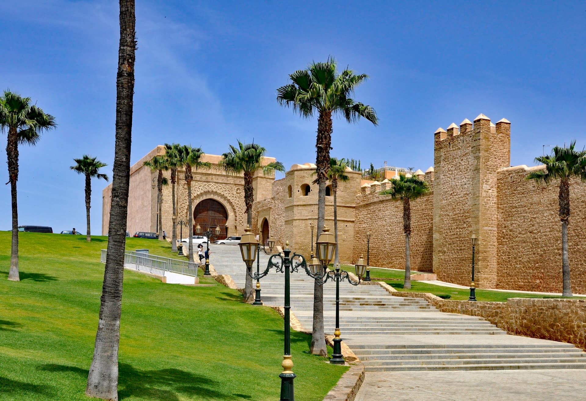 The walls of the Kasbah of the Udayas in Rabat rising above the river mouth, with the city beyond.